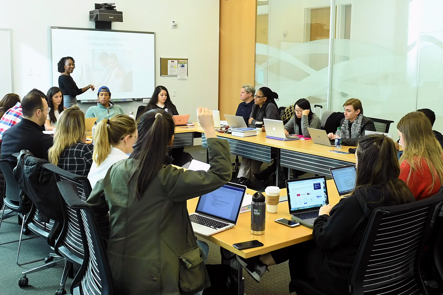 Law Seminar with Student Raising Hand