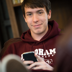 Male student at conference table - SM