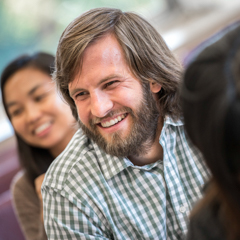 Male student smiling off camera - SM