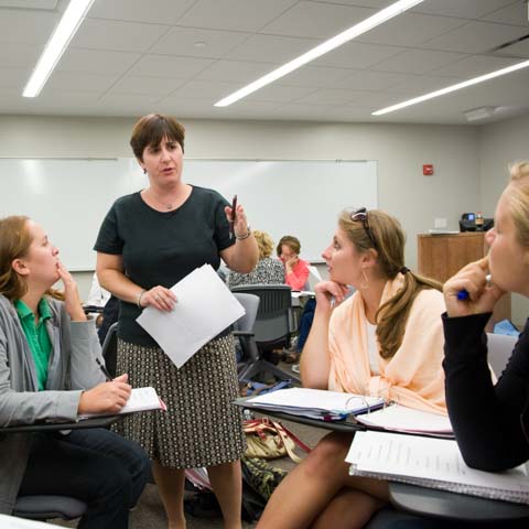 Female faculty Member making a point - LG