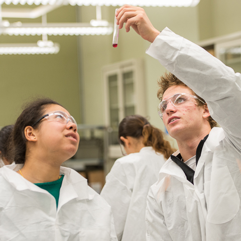 Two Students with Test Tube