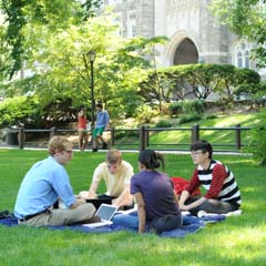 Circle of students sitting on lawn - SM