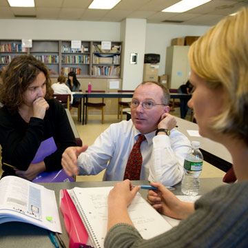 Faculty member with two female students