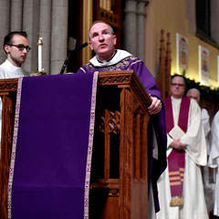 Father McShane celebrates mass