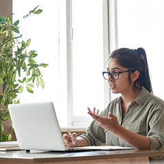 Image of a female talking through computer