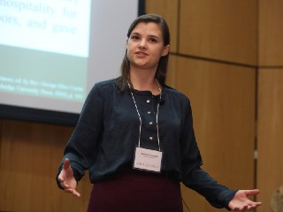 Louisa Foroughi presenting at the 3MT competition