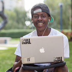 Male Student with Laptop