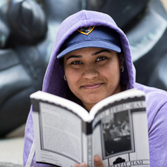 Female Student Reading a Book