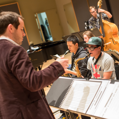 Conductor leading jazz band - LG