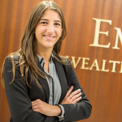 Intern standing in front of business office - SM