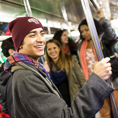 Student Standing in Subway