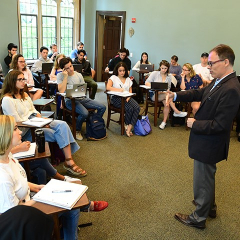 Professor George Demacopoulos teaches a theology class in Duane Library at Fordham’s Rose Hill Campus.