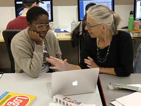 Professor working with Student