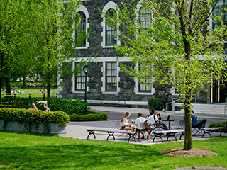 Group of Students Sitting Around a Table Outside - Small, Ratio Crop