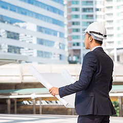 Architect overseeing construction project