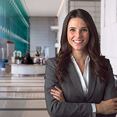 Woman in suit smiling