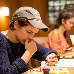 Female Student Intensely Focused in Class