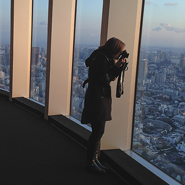 Student Photographing Cityscape