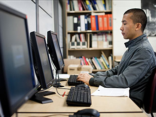 Student sitting at computer