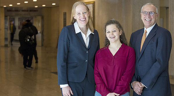 John Toffolon (right), Cindy Vojtech (left), and Samantha Barrett, a first-year student at the Gabelli School