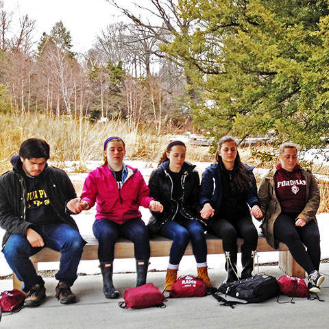 Manresa Scholars practicing a guided Ignatian meditation on the Urban Immersion Service Project