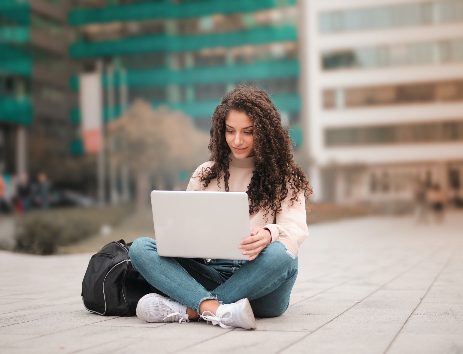 Female Student on laptop studying