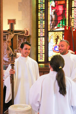 group of altar servers at Mass