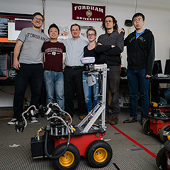 Computer and Information Sciences Professor Lyons with Students