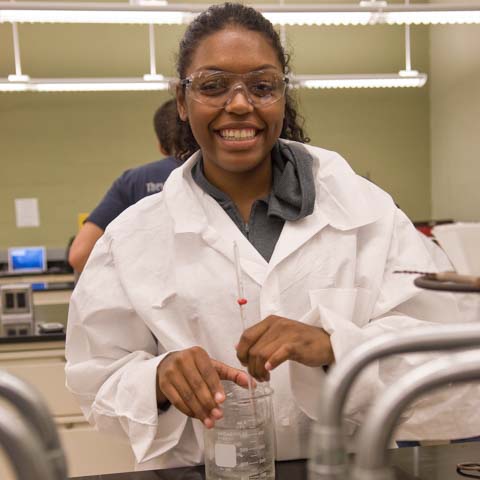 Female, african-american student looking into camera - LG