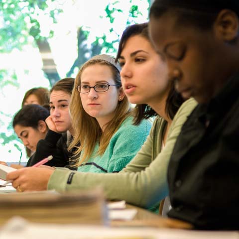 Row of students listening intently - LG