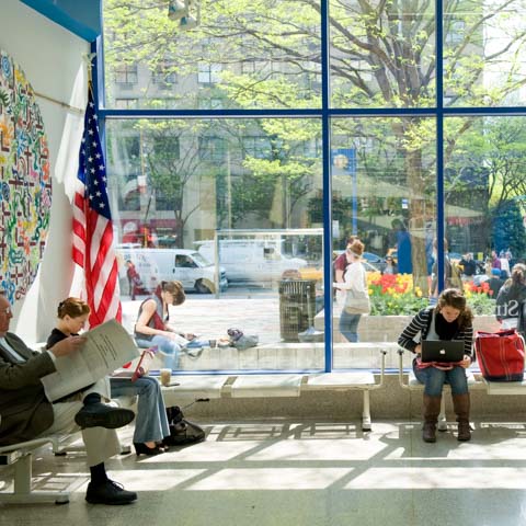 Interior of students in sunlit lobby - LG