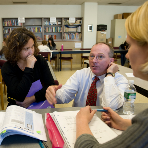 Faculty member with two female students - LG