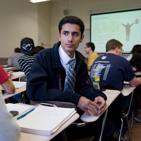 Male grad student in classroom - LG