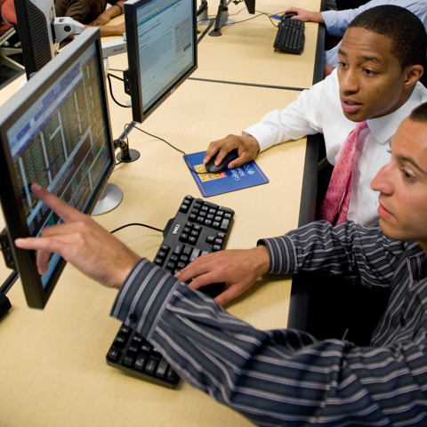 Two students checking PC screen - LG