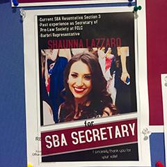 Photo of campaign poster for American Studies alumna Shaunna Lazarro, running for the position of Secretary of the Fordham Law School Student Bar Association