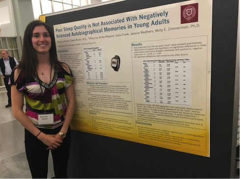 Student in front of scientific poster on sleep quality and memories