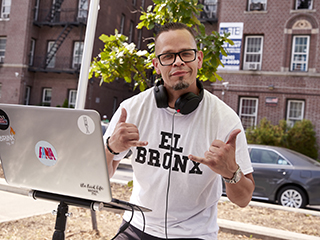 DJ with El Bronx shirt
